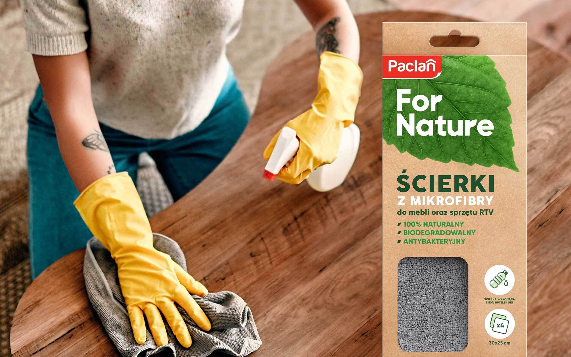 Woman wiping the table and ecological design of Paclan For Nature packaging.