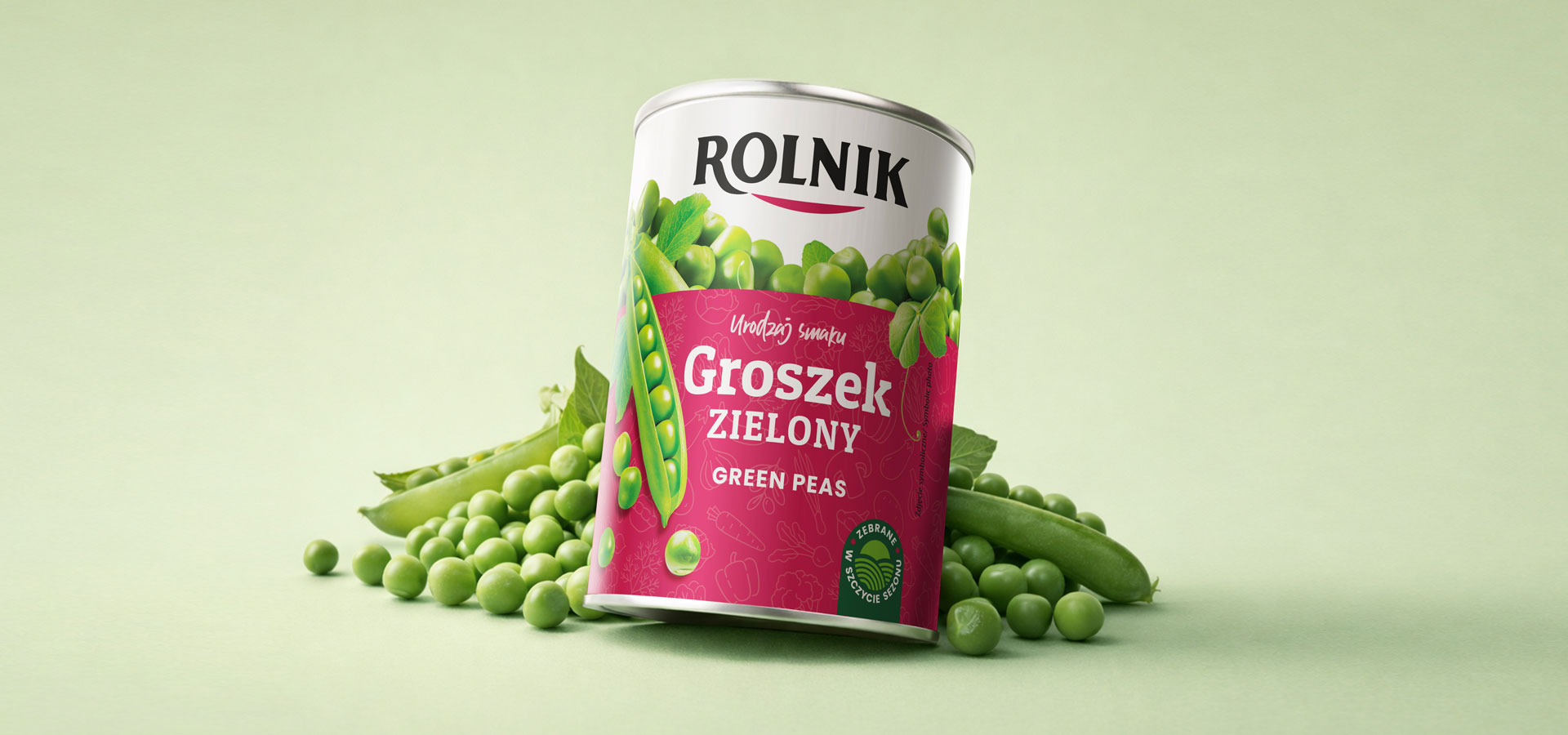 rebranding_marki_Rolnik - wizualizacja nowego opakowania groszku w puszce otoczona świeżym groszkiem